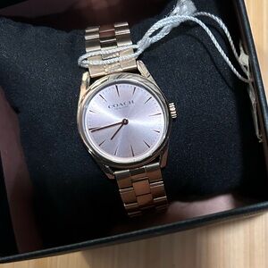 Coach Modern Luxury Watch With 28mm Champagne Pink Tone Face